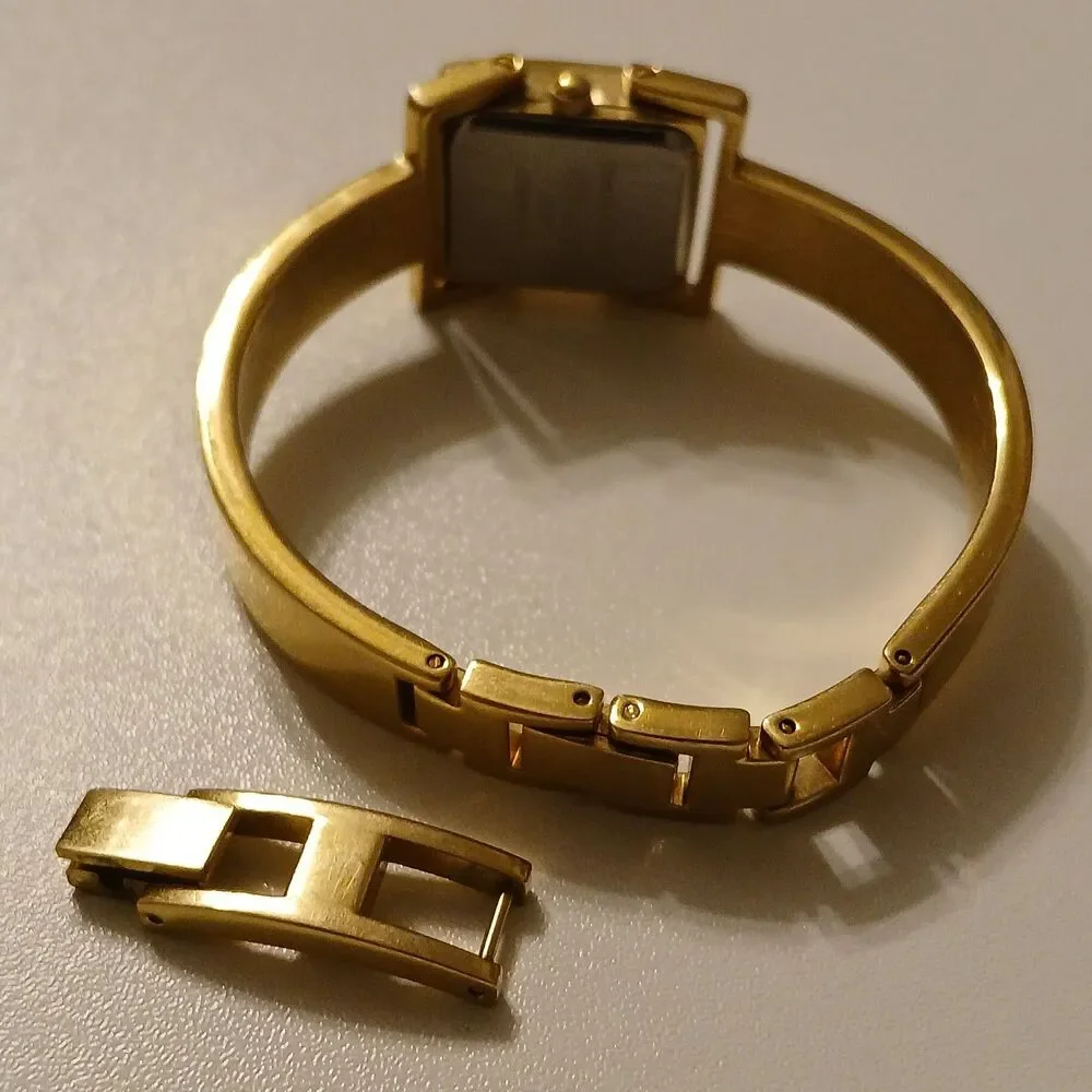 VTG 90s Joan Rivers Classics Gold Tone MOP Dial Quartz Bangle Women's Watch 19mm
